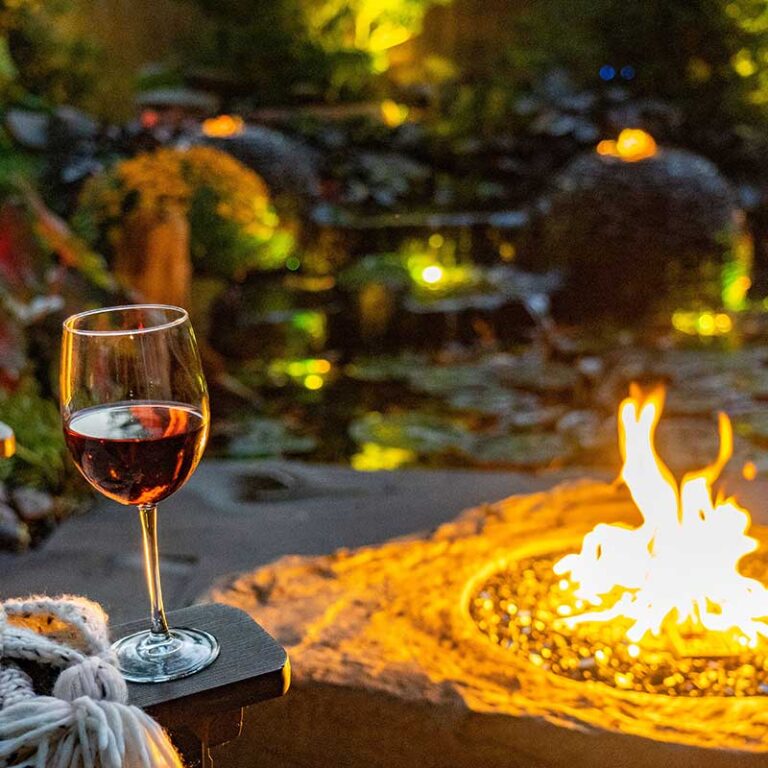 Enjoying-wine-near-waterfall
