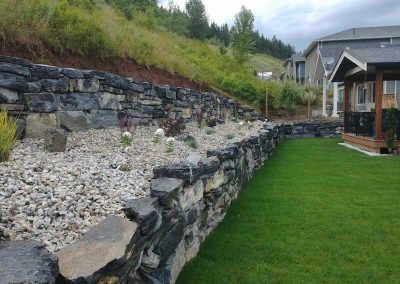 Kalagan Outdoor Design grey stone retaining wall
